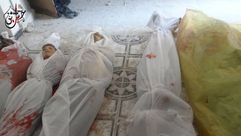 جثث قتلى سوريا بعد القصف على جسرين بريف دمشق