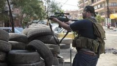 مسلح خلال الاشتباكات في طرابلس مع الجيش اللبناني- فيس بوك