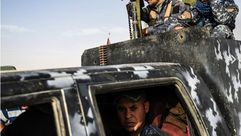 قوات عراقية في مدرعة قرب القيارة جنوب الموصل - أف ب