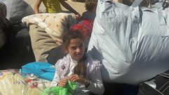 طفلة ترحل مع أهلها من بلدة المعضمية - الغوطة الغربية - ريف دمشق سوريا 19-10-2016