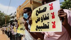 لافتات ترفض التطبيع في السودان- الأناضول