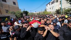 تشييع جثمان الشهيد عمرو عابد (18 عاما) في بلدة بيتونيا قرب رام الله- وفا
