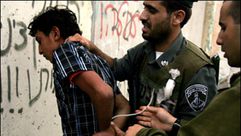 الاحتلال اعتقال فلسطينين - أ ف ب