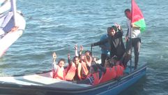 اطفال مشاركين بفعاليات سفينة آمال غزة - الاناضول