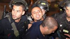 أسير - فلسطيني يبتسم خلال اعتقال من قبل الاحتلال - فلسطين - الضفة - إسرائيل - أسرى