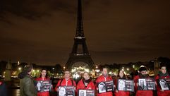 إطفاء برج ايفل عشية اليوم العالمي "ضد الافلات من العقاب" جيتي