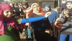 مصريات يرقصن أيام الاقتراع على الدستور المصري - أرشيفية