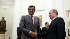 امير قطر تميم بن حمد والرئيس الروسي فلاديمير بوتين - أ ف ب
