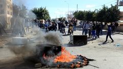 اشتباكات في القصرين بين الشرطة التونسية ومحتجين على البطالة - أرشيفية