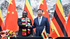 رئيس الصين رئيس زيمبابوي موغابي - جيتي