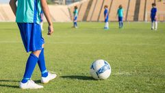 أطفال في ملعب لكرة القدم CC0