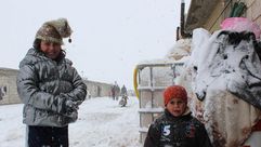 الثلوج في مخيمات عرسال للاجئين السوريين بلبنان - aa_picture_20131211_1151410_web
