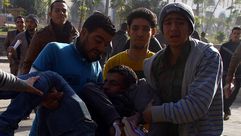 جامعة الأزهر - القاهرة - مصر - طالب مصاب في اشتباك مع الامن 29-12-2013 (الأناضول)