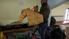 الضفة الغربية - حملة شتاء دافئ لمساعدة اللاجئين السوريين في مخيم الزعتري (الأناضول)