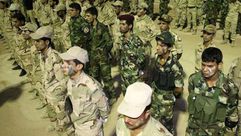 عناصر من المليشيات الشيعية تشرف إيران  على إعدادهم في العراق- أ ف ب