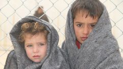 أطفال لاجئين