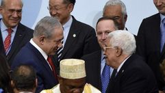نتنياهو عباس قمة المناخ - أ ف ب