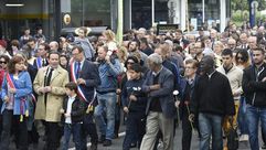 مسيرة في فرنسا تكريما لرجل شرط وزوجته قتلهما تنظيم الدولة قرب باريس - أ ف ب