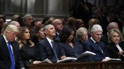 كلينتون أوباما ترامب في جنازة بوش الأب - جيتي