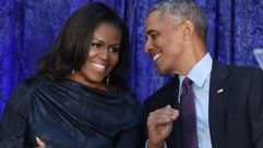 أوباما وزوجته - جيتي
