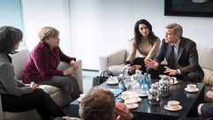الممثل الامريكي جورج كلوني - أمل علم الدين - مع المستشارة الألمانية أنجيلا ميركل لمناقشة قضية اللاجئ