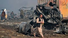 شاحنات  حريق  معبر  أفغانستان  الحدود  إيران- جيتي