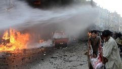 مقتل 10 وإصابة 55 في تفجيرين أمام كنيستين في باكستان