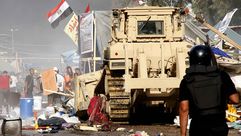 جرافة تدمر اعتصام رابعة وسط القاهرة- جيتي