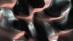 صورة من وكالة ناسا بتاريخ 13 آذار/مارس 2014 لكثبان رملية على المريخ