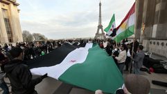 متظاهرون سوريون - مؤيدون للثورة - باريس (أ ف ب)