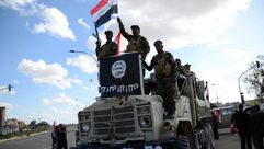 القوات العراقية في مدينة تكريت بعد السيطرة عليها وخروج داعش - أ ف ب