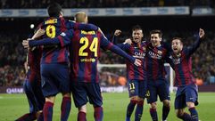لاعبو برشلونة يحتفلون في 22 آذار/مارس 2015