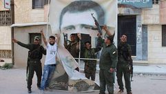 سوريا القامشلي مقاتلون اكراد يمزقون صورة بشار الاسد "عنب بلدي" 20/4/2016