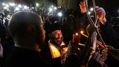 مسيحيون في الأردن يحتفلون بعيد القيامة وسط إجراءات أمن مشددة ا ف ب