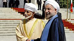 سلطان عُمان قابوس والرئيس الإيراني حسن روحاني 2013