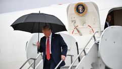 ترامب مظلة- جيتي