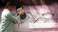 جدارية في غزة تضامنًا مع الأسير خضر عدنان - 02- جدارية في غزة تضامنًا مع الأسير خضر عدنان - الاناضول