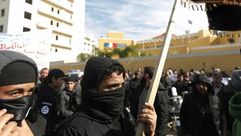 عناصر مناصرة للتنظيم خلال تظاهرة ضد صحيفة شارلي ايبدو بغزة - أ ف ب