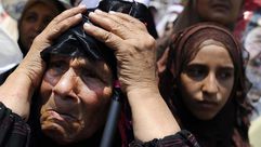 مسنّة مصرية تبكي القتلى في فض ميدان رابعة العدوية ـ الأناضول