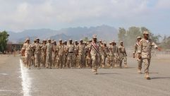 قوات يمنية تتدرب على يد السعوديين في خور مكسر شرق عدن- أ ف ب