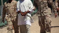 أحد معتقلي غوانتانامو خلال نقله في السجن- جيتي