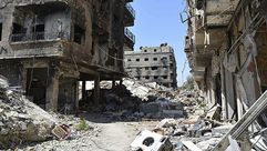 الدمار في مخيم اليرموك في سوريا - جيتي