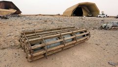 قنابل طائرات ملقاة داخل قاعدة الوطية الليبية- جيتي