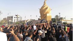 تشييع جثمان ناشط حراكي الوزني في كربلاء في العراق اغتيل تويتر