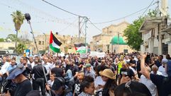 رفع الأعلام الفلسطينية في اللد- عرب48