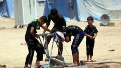 نازحون العراق في المخيمات يستقبلون رمضان بظروف صعبة - aa_picture_20140628_2672804_web
