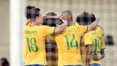 لاعبو المنتخب البرازيلي يحتفلون بالتسجيل في مرمى بنما في 3 حزيران/يونيو 2014