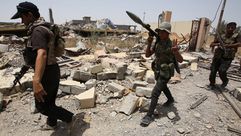 القوات الكردية في قتال ضد داعش شمال الرقة - ا ف ب