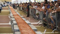 اطول بيتزا "مارغاريتا" في العالم في ميلانو في 20 حزيران/يونيو 2015