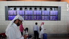 مسافرون في مطار حمد الدولي في الدوحة - أ ف ب